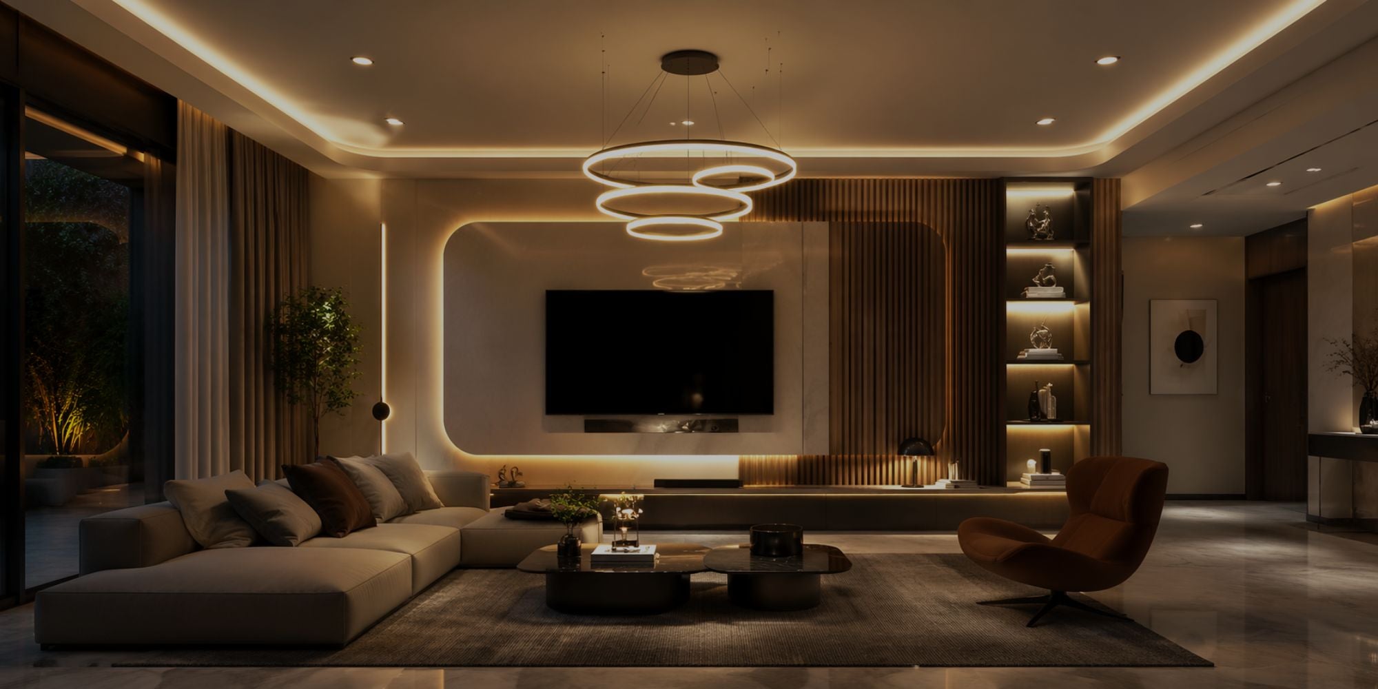 Modern living room with a large TV, comfortable furniture, and stylish decor.